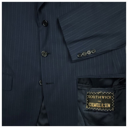 Close-up of navy blue rope stripe pattern and horn buttons on vintage 1990s Southwick wool sport coat 42R