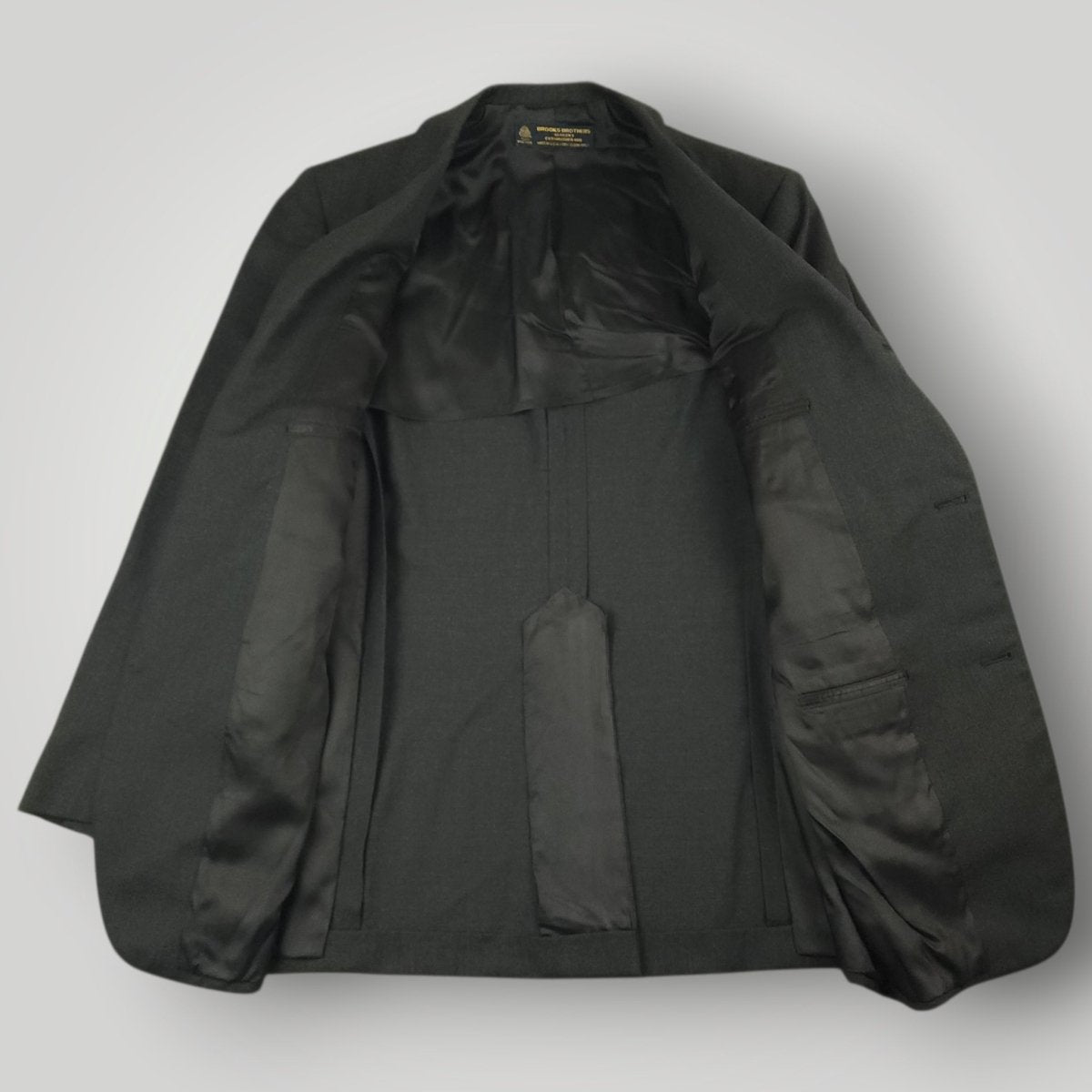 Interior view of Brooks Brothers Makers sport coat with dark lining and tailored construction