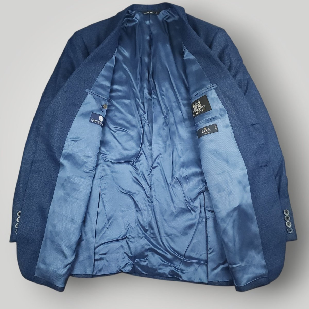 Interior view of Coppley sport coat with fully lined construction and interior pockets.