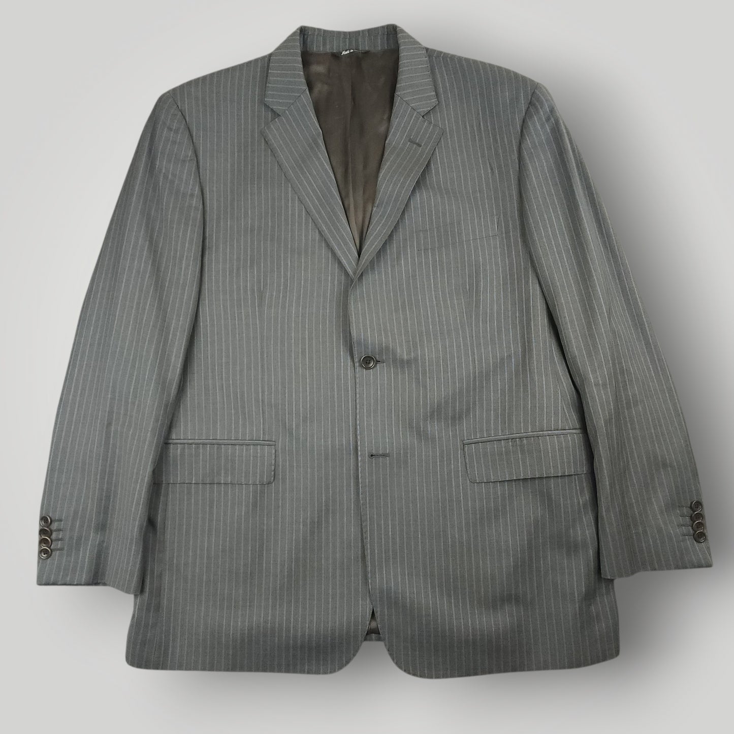 Rear view of gray pinstripe Traveller suit jacket