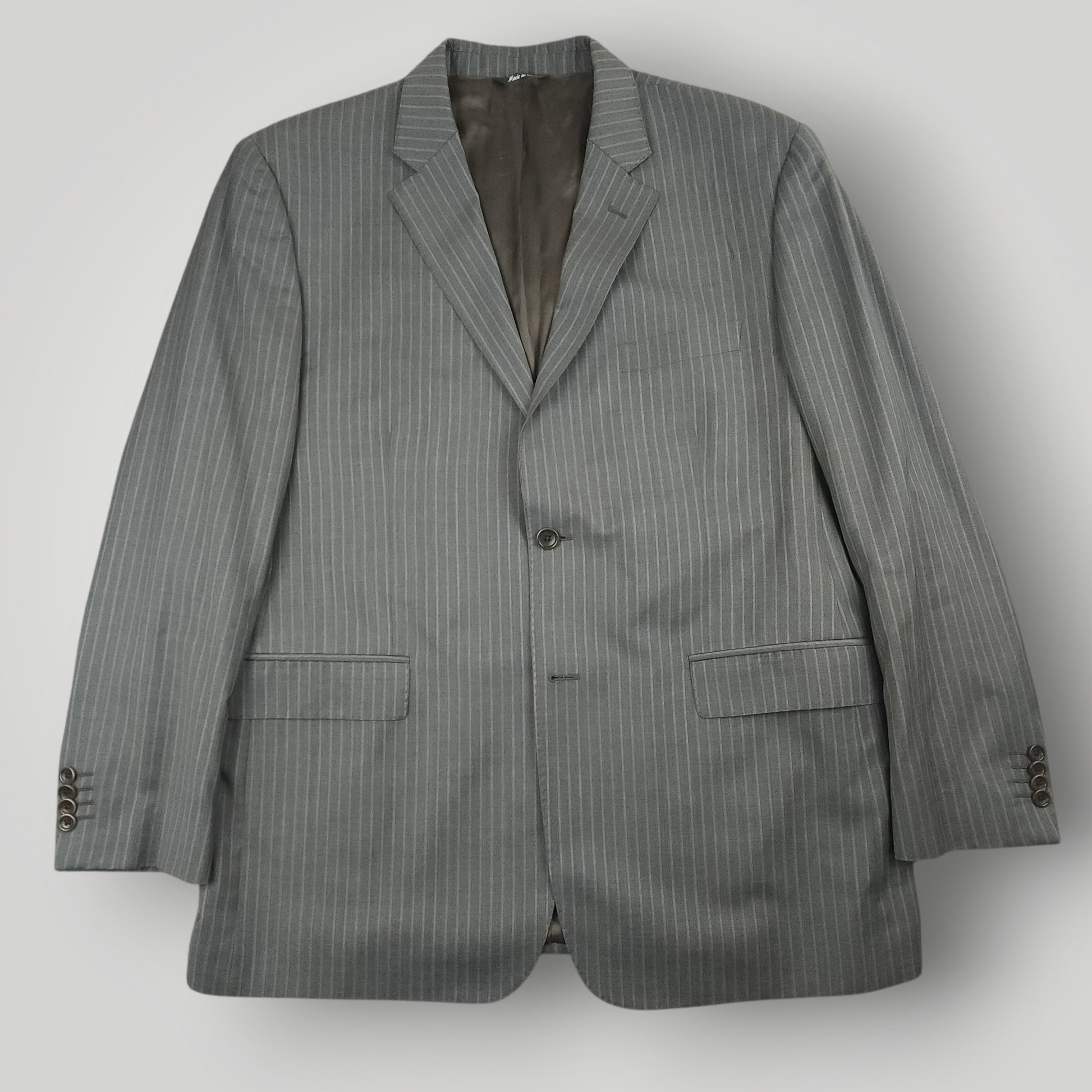 Rear view of gray pinstripe Traveller suit jacket