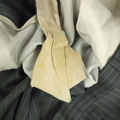 Minor wear and condition detail inside suit trousers waistband