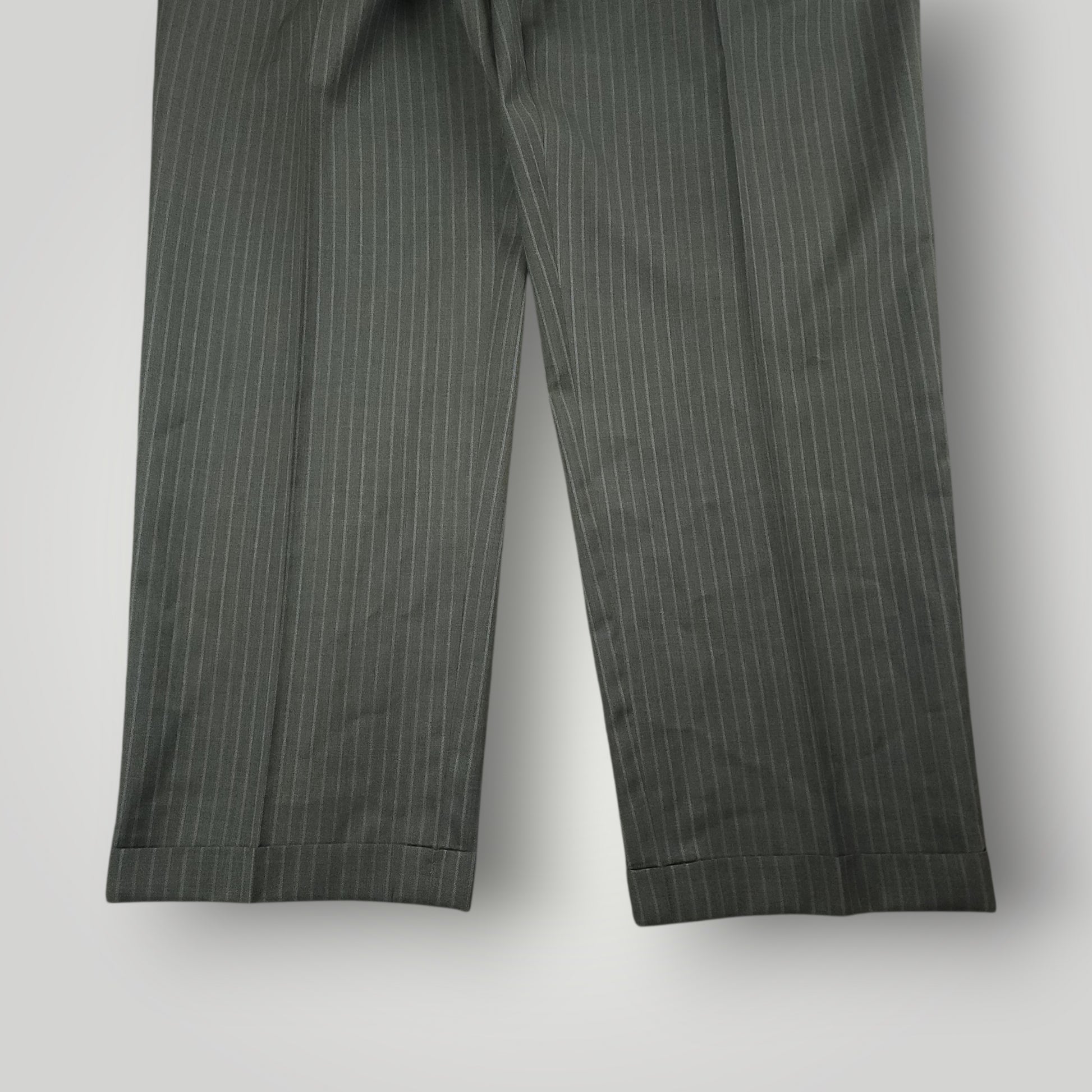 Full length view of matching gray pinstripe suit trousers