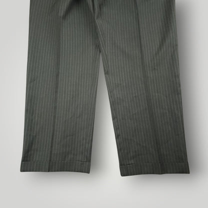 Full length view of matching gray pinstripe suit trousers