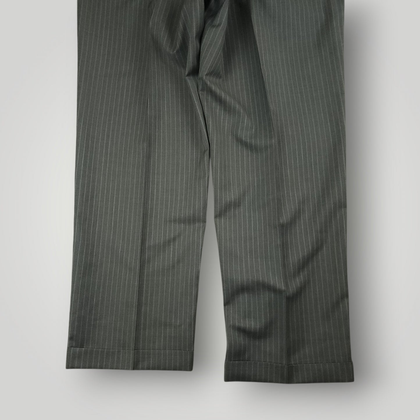 Trouser leg and cuff detail on gray pinstripe suit pants