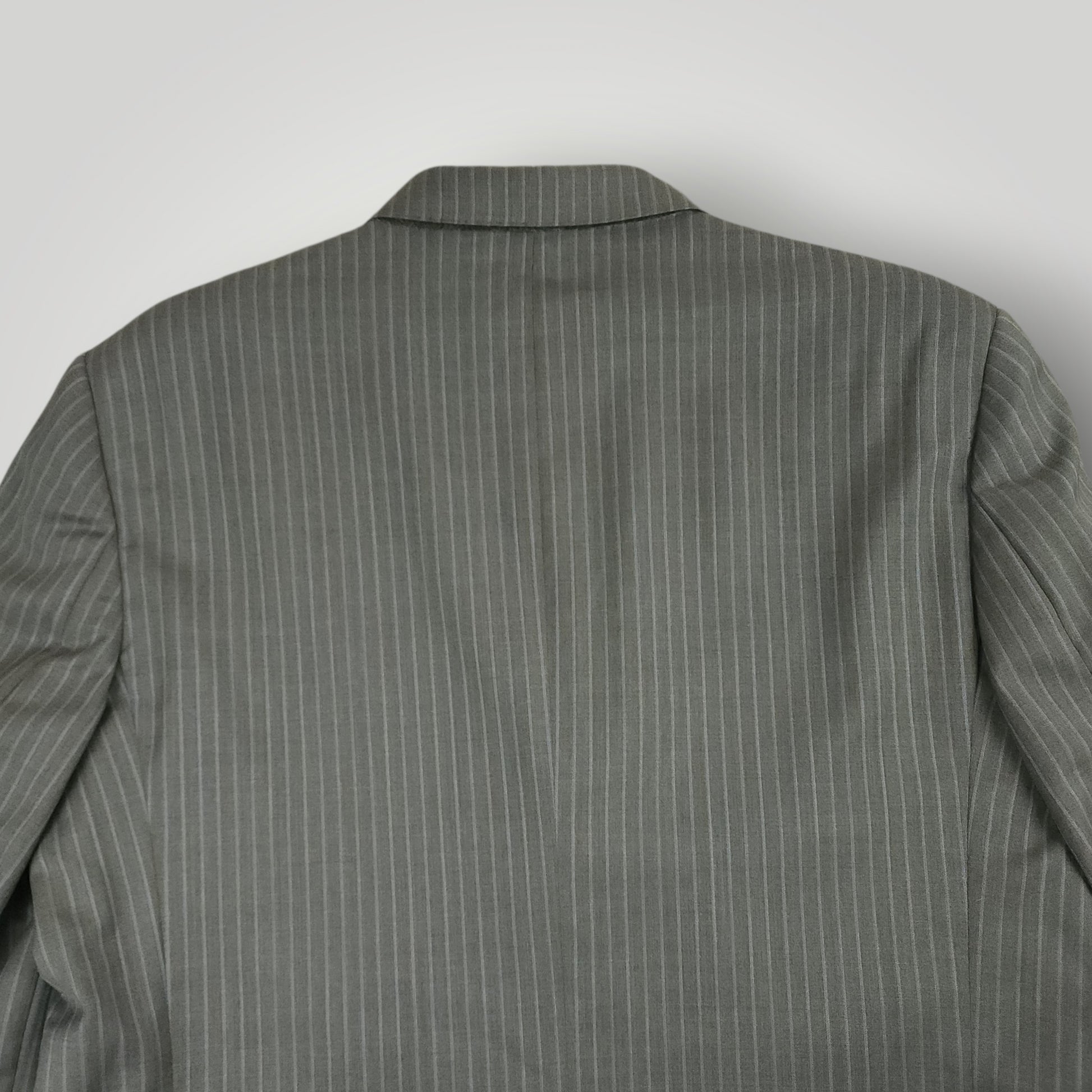 Rear jacket shoulder detail showing gray pinstripe pattern and tailoring