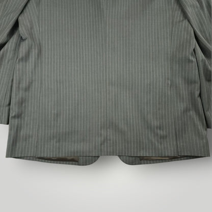 Rear lower jacket detail showing gray pinstripe pattern and tailoring