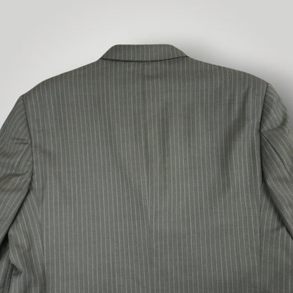 Rear jacket shoulder detail showing gray pinstripe pattern and tailoring