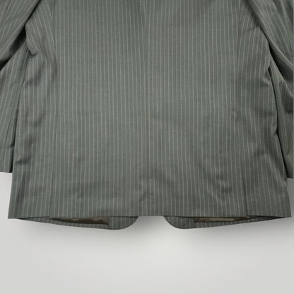 Rear lower jacket detail showing gray pinstripe pattern and tailoring
