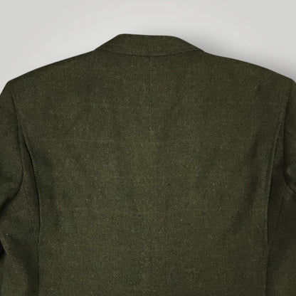 Rear shoulder detail showing olive tweed texture and weave pattern
