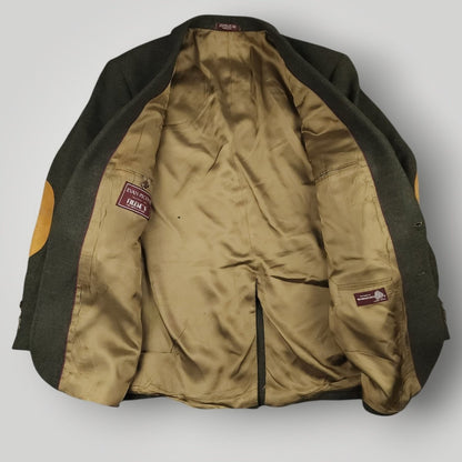 Interior view of vintage olive sport coat showing lining and construction details