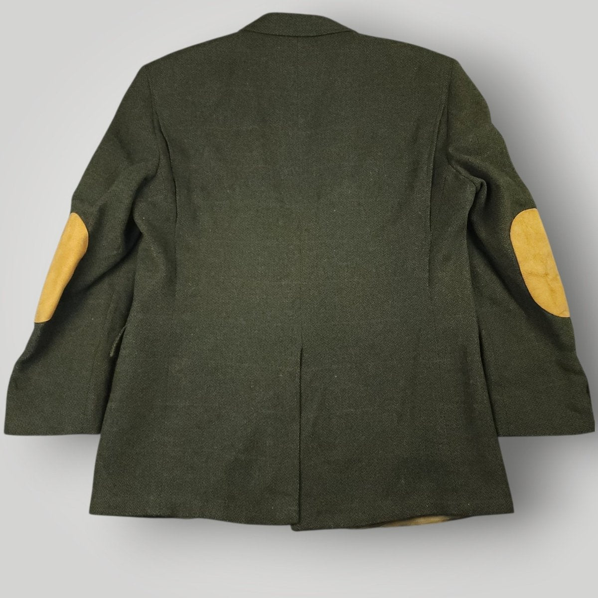 Rear view of vintage country tweed jacket showing classic tailored silhouette