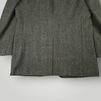 Back view of a gray herringbone tweed jacket