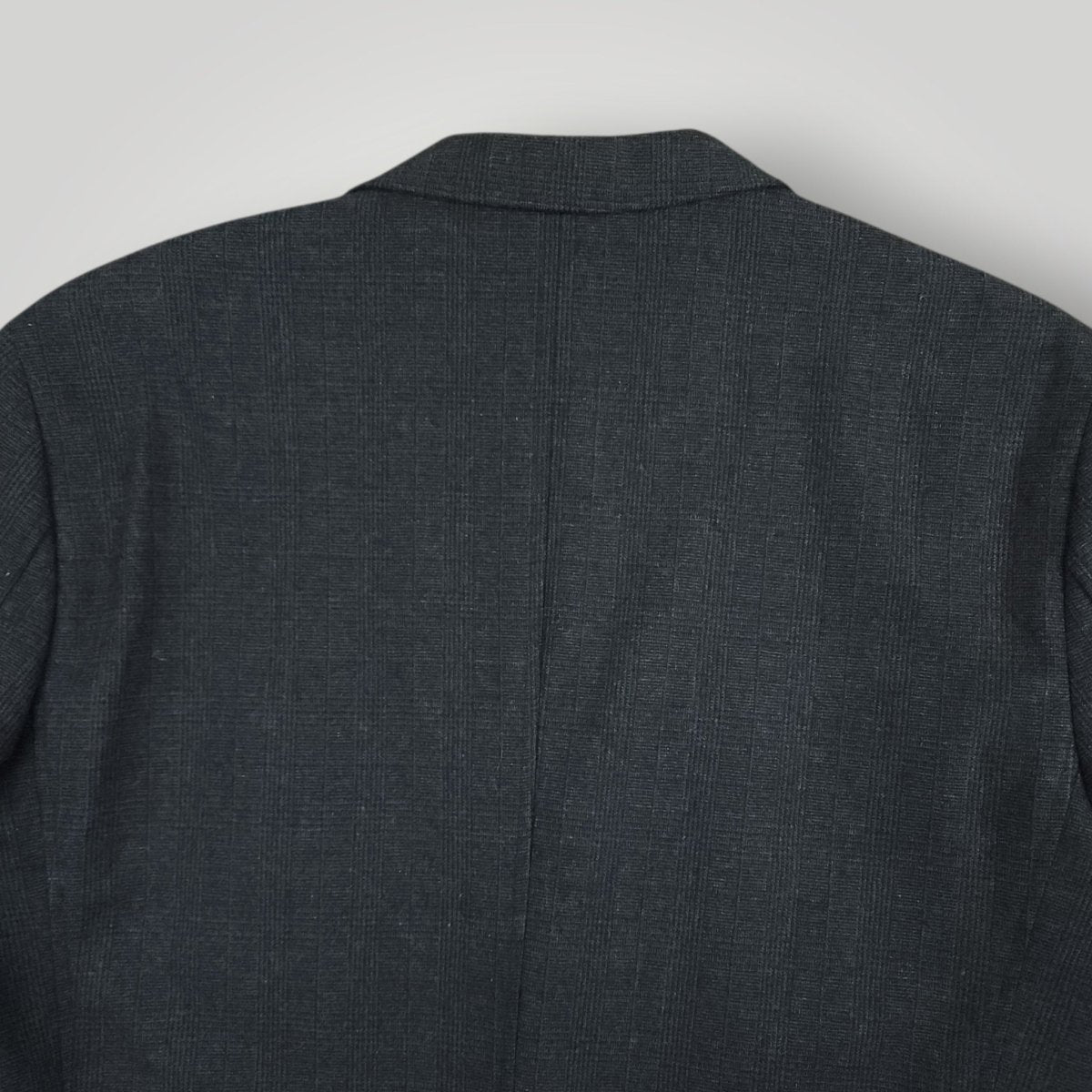 Upper back detail of Joseph Abboud blue glen plaid hacking jacket