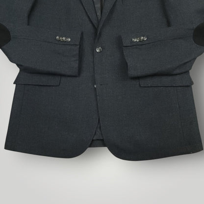 Lower front detail of Joseph Abboud hacking jacket showing flap pockets