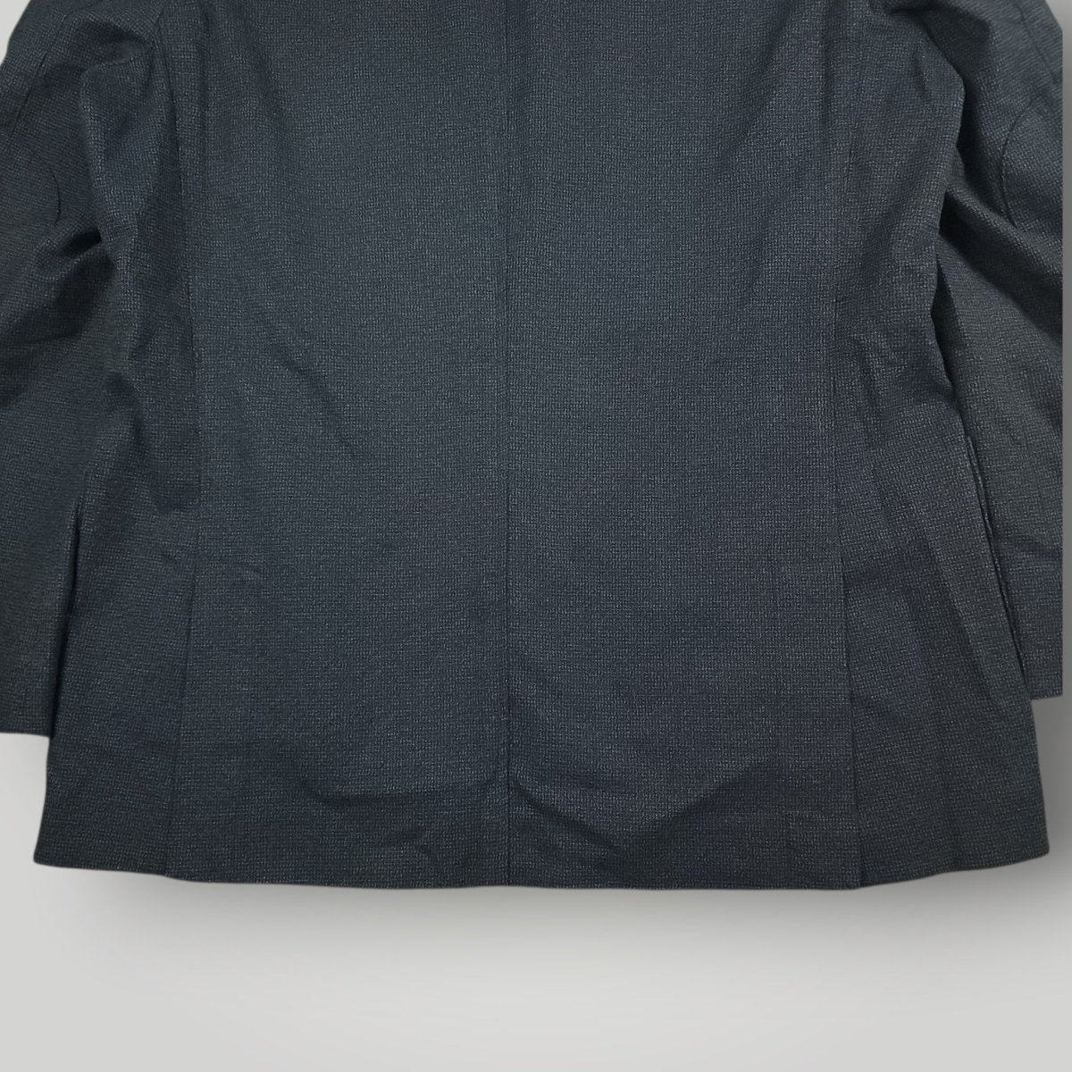 Lower rear view of Joseph Abboud blue sport coat showing back vent construction