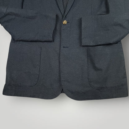 Lower front detail of Joseph Abboud blue sport coat showing patch pockets