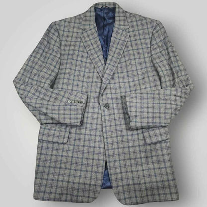 Tom James Innocenti Italian wool plaid sack jacket sport coat front view in men's size 40L.
