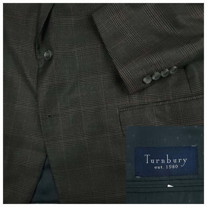 Turnbury wool silk glen plaid sport coat fabric detail showing charcoal gray Prince of Wales check pattern and Turnbury label.