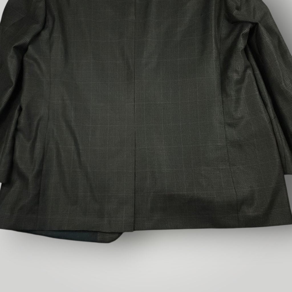 Lower rear detail of Turnbury wool silk sport coat highlighting drape and construction.