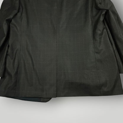 Lower rear detail of Turnbury wool silk sport coat highlighting drape and construction.