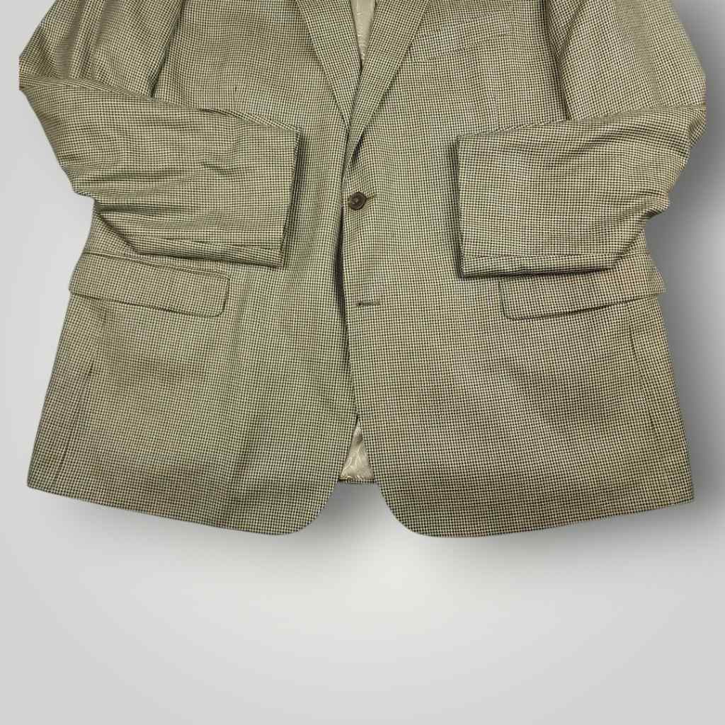 Lower front detail of Turnbury gray wool silk houndstooth sport coat showing flap pockets