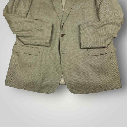 Lower front detail of Turnbury gray wool silk houndstooth sport coat showing flap pockets