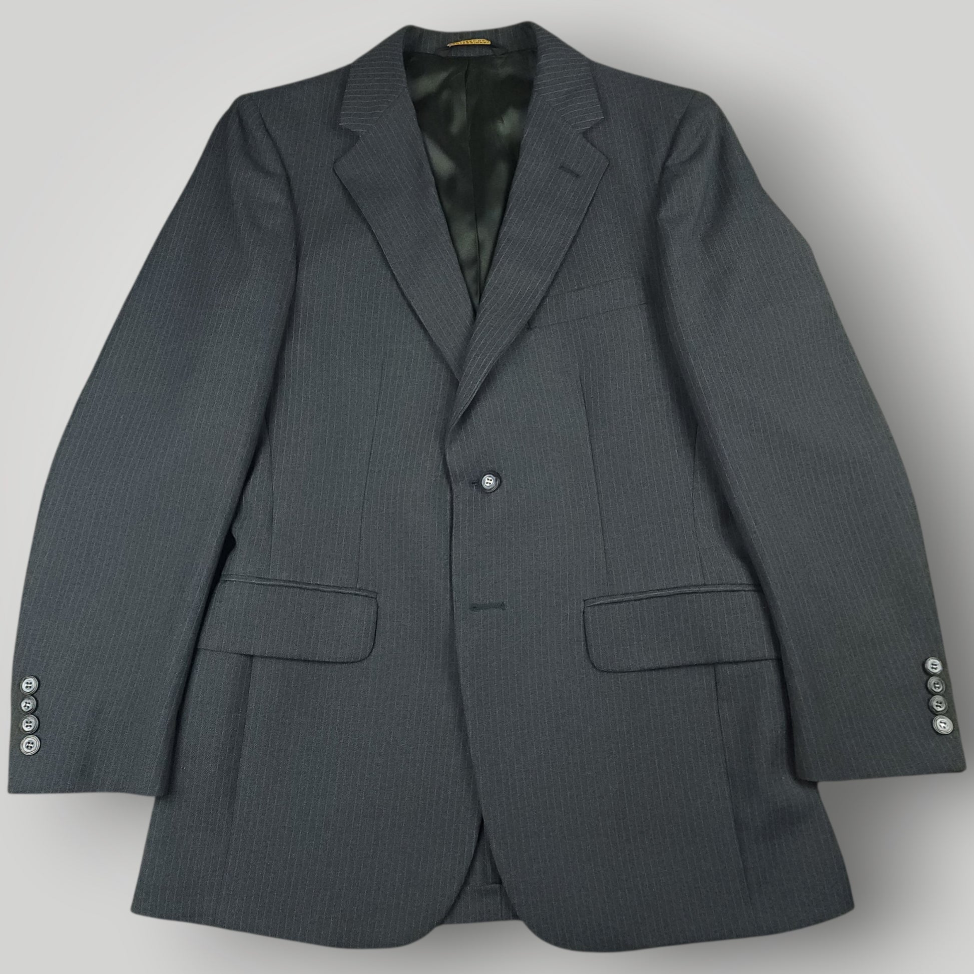 Front view of vintage steel blue pinstripe suit jacket