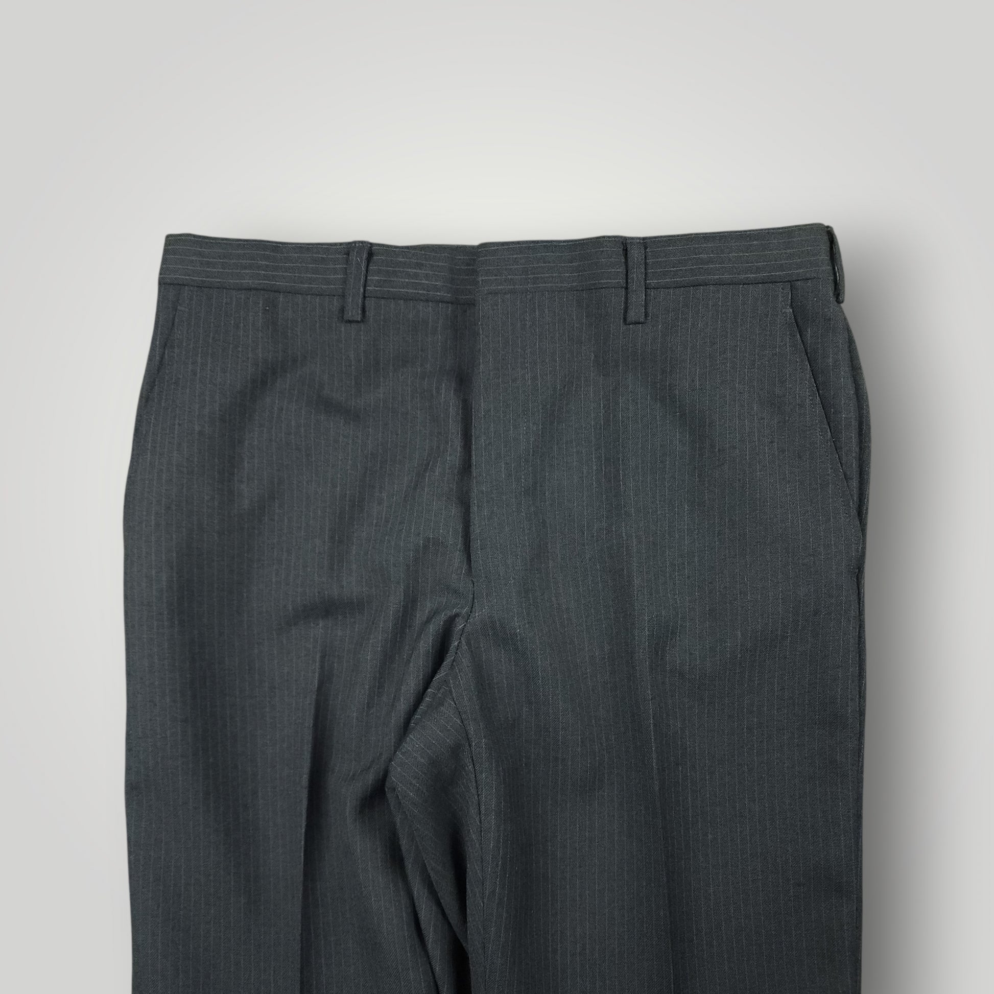 Waist and rise detail of vintage tropical wool trousers
