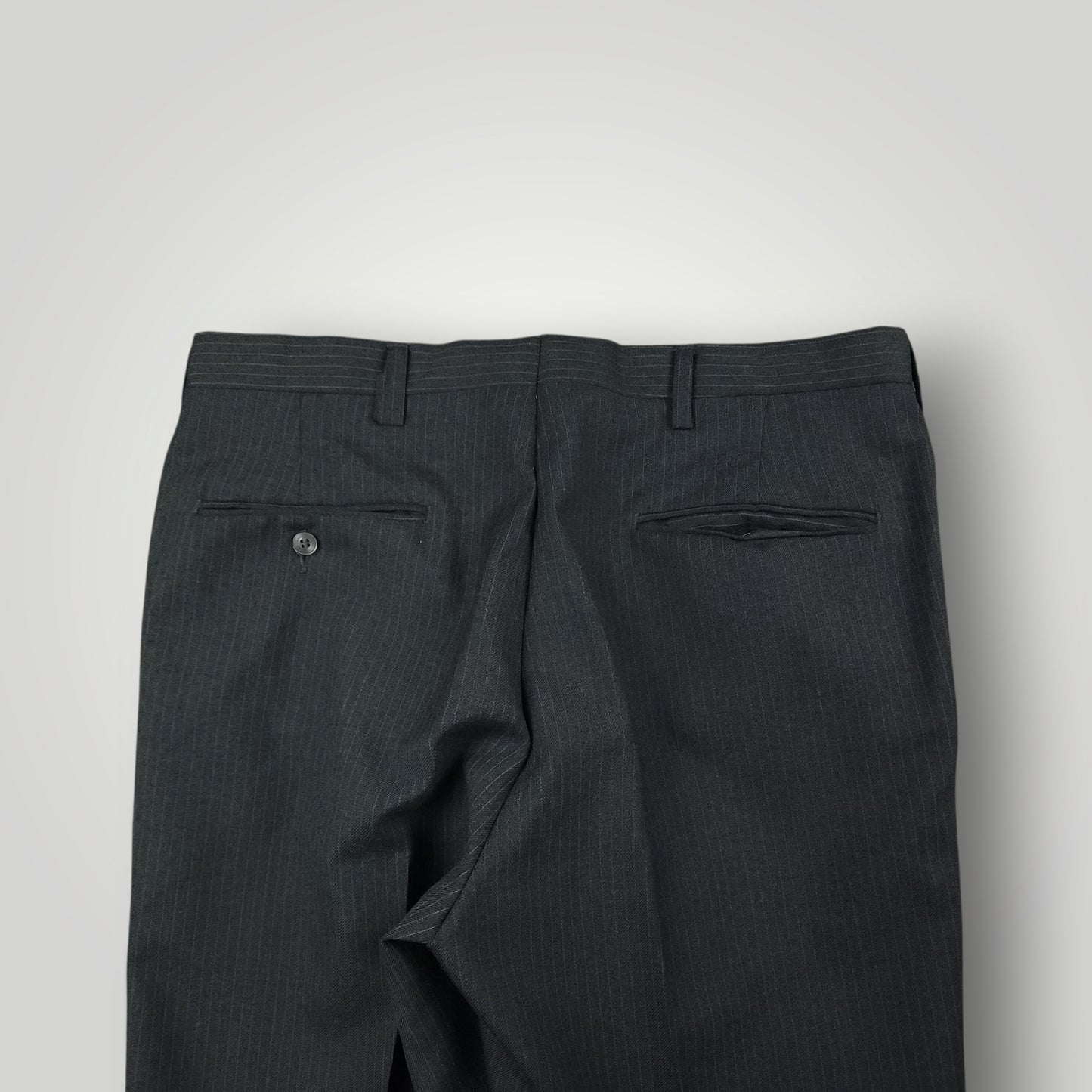 Rear pocket detail of vintage steel blue trousers