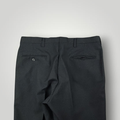 Rear pocket detail of vintage steel blue trousers