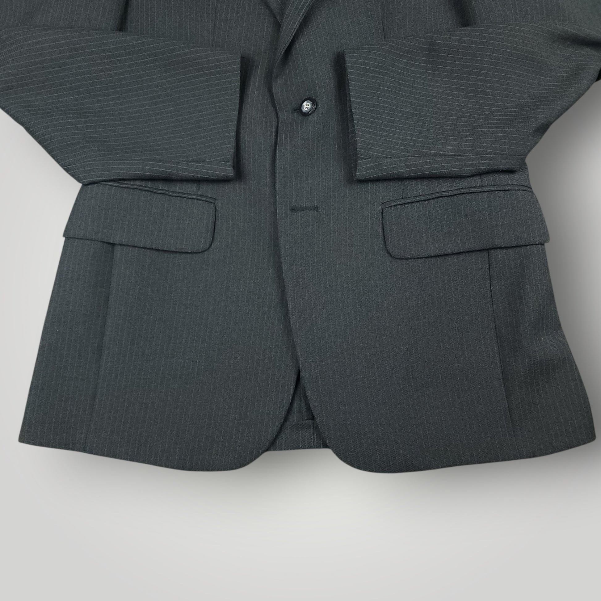 Flap pocket detail on vintage steel blue pinstripe suit jacket