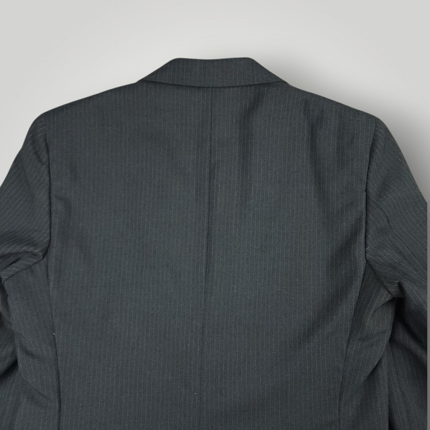 Vintage J. Riggings steel blue suit jacket angled rear view