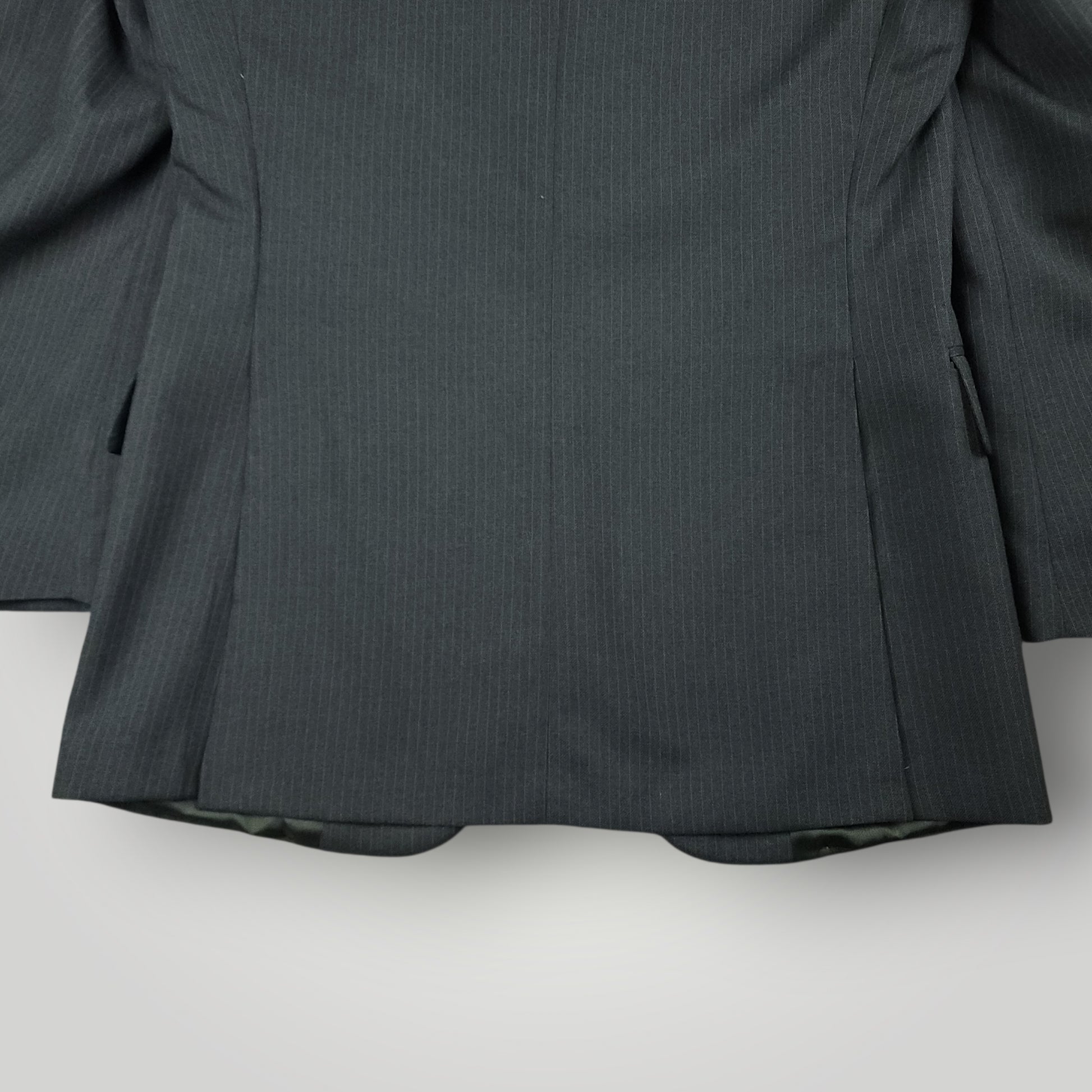 Rear vent detail on vintage tropical wool suit jacket