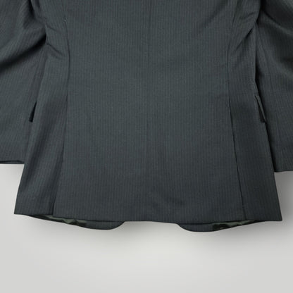 Rear vent detail on vintage tropical wool suit jacket