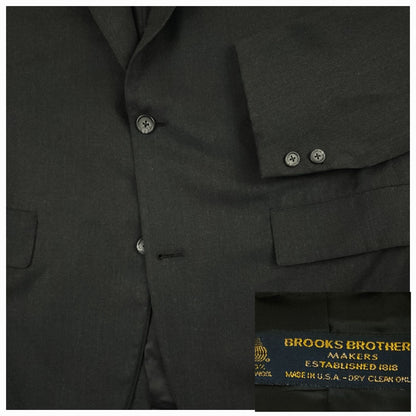 Close up of Brooks Brothers Makers sack jacket showing flap pocket and button detail
