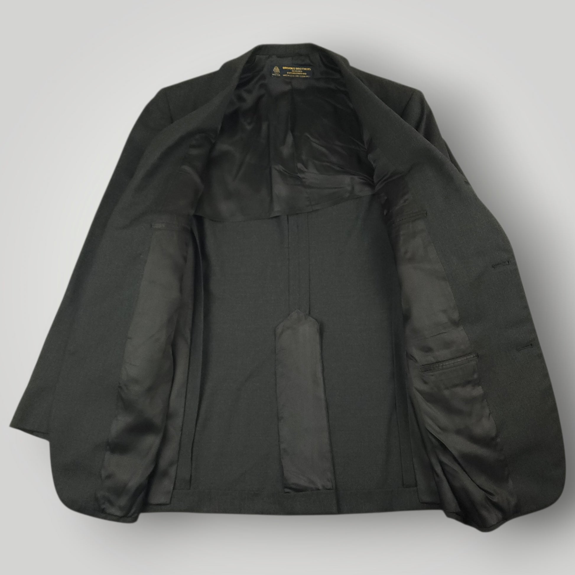 Interior view of Brooks Brothers Makers sport coat with dark lining and tailored construction