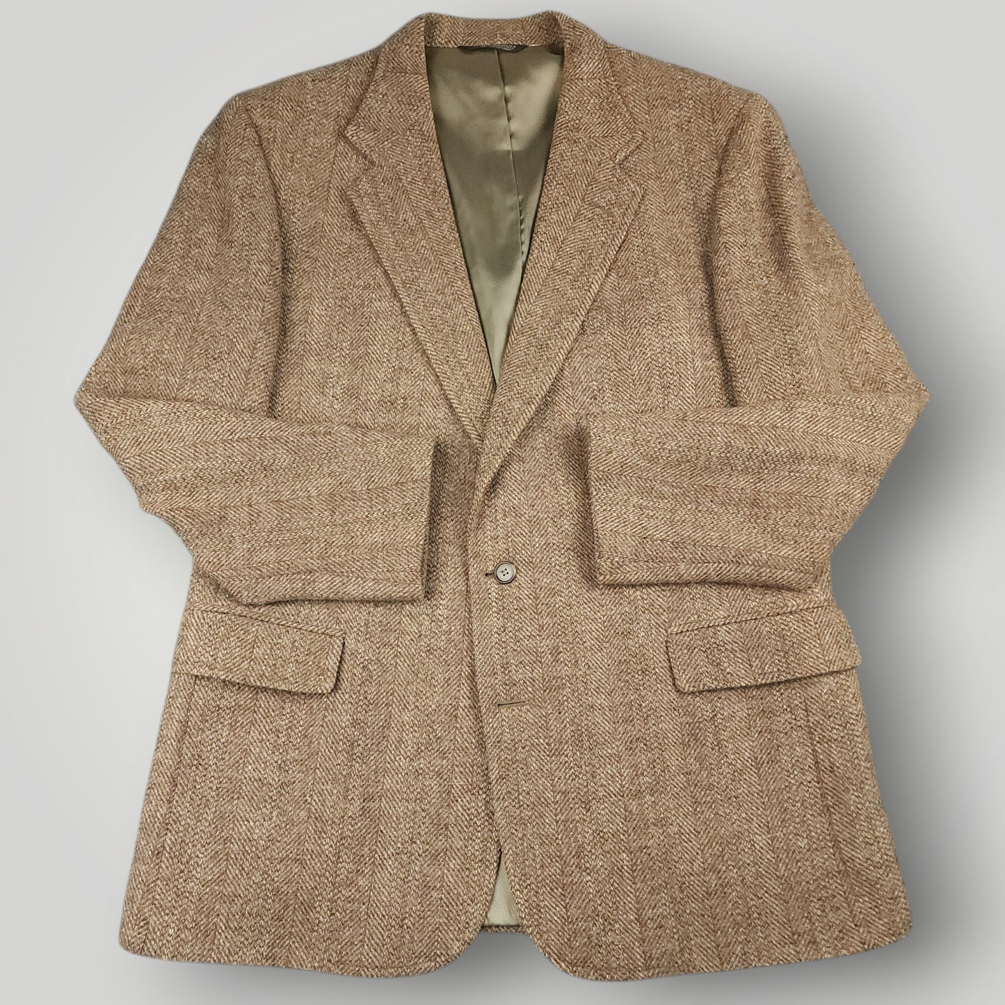 Vintage Harris Tweed sport coat in brown herringbone wool with classic ivy styling