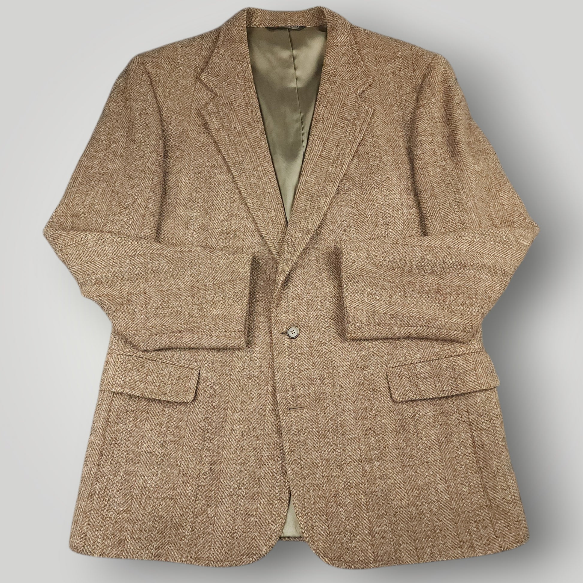 Vintage Harris Tweed sport coat in brown herringbone wool with classic ivy styling