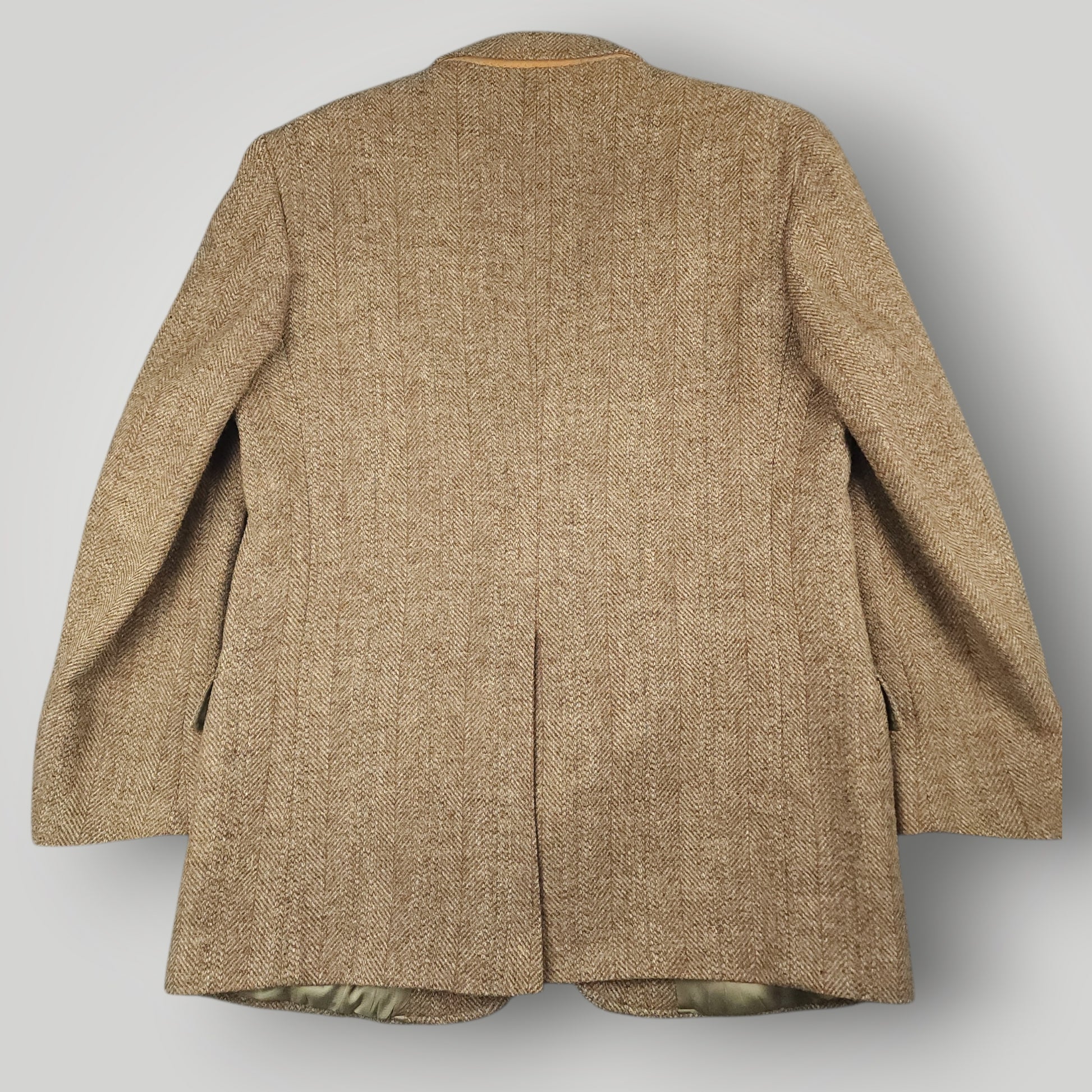 Rear view of Harris Tweed sport coat showing classic tailored silhouette
