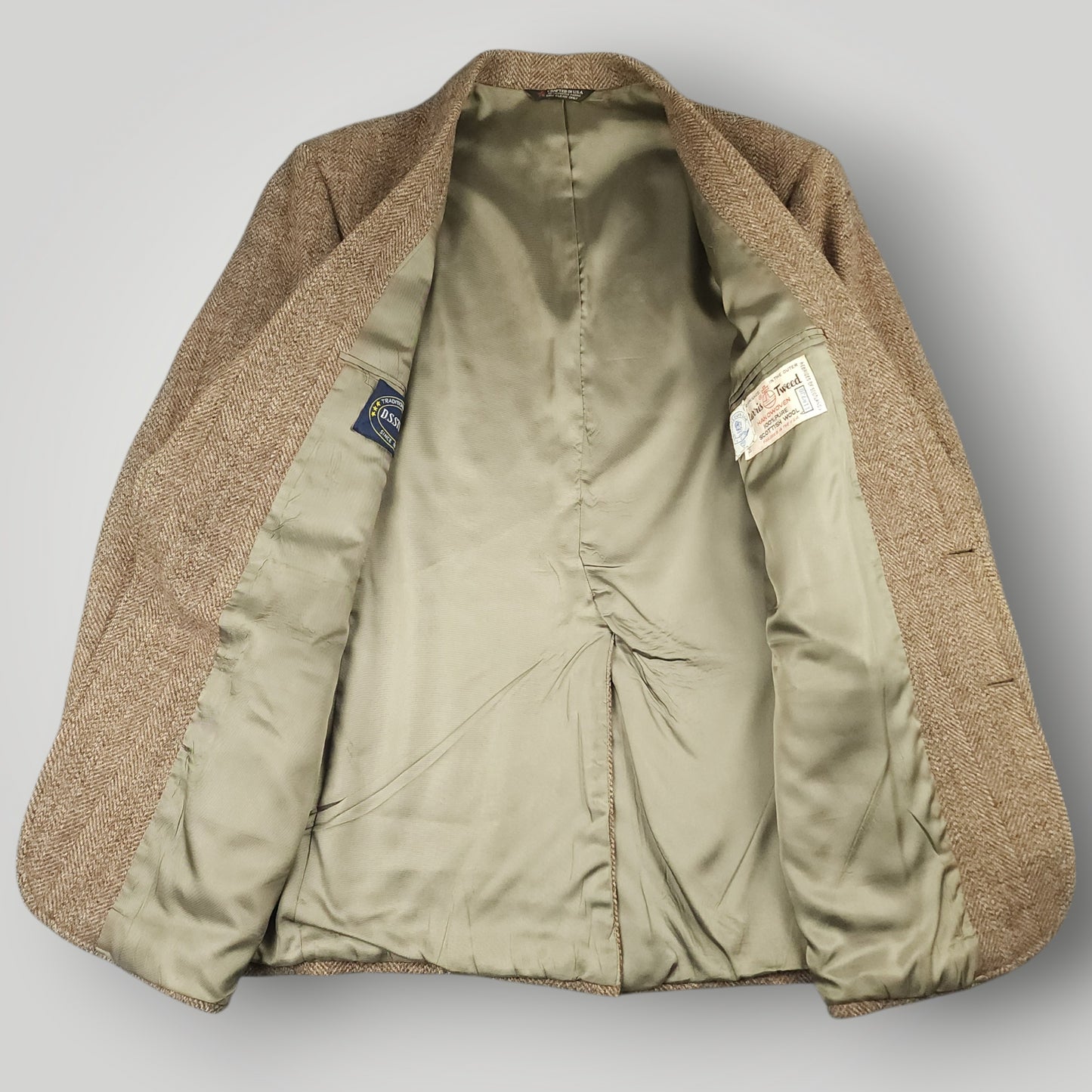 Interior view of vintage Harris Tweed jacket with satin lining and construction details
