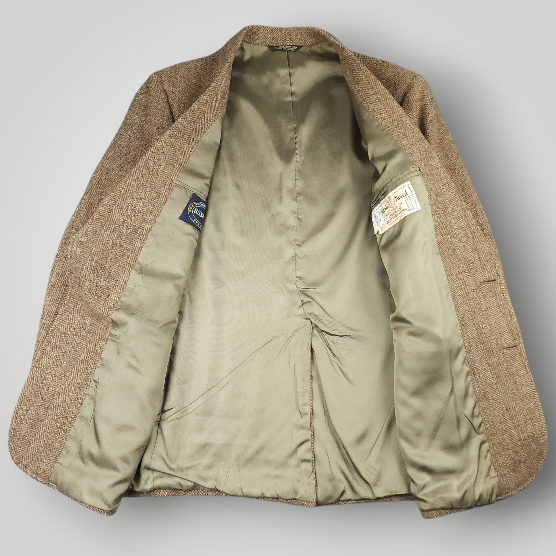 Interior view of vintage Harris Tweed jacket with satin lining and construction details