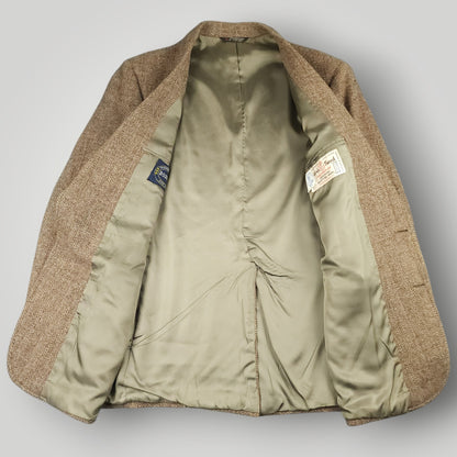 Interior view of vintage Harris Tweed jacket with satin lining and construction details